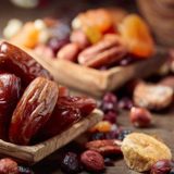 depositphotos_232037512-stock-photo-various-dried-fruits-nuts-old